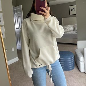 Cream colored funnel neck fleece